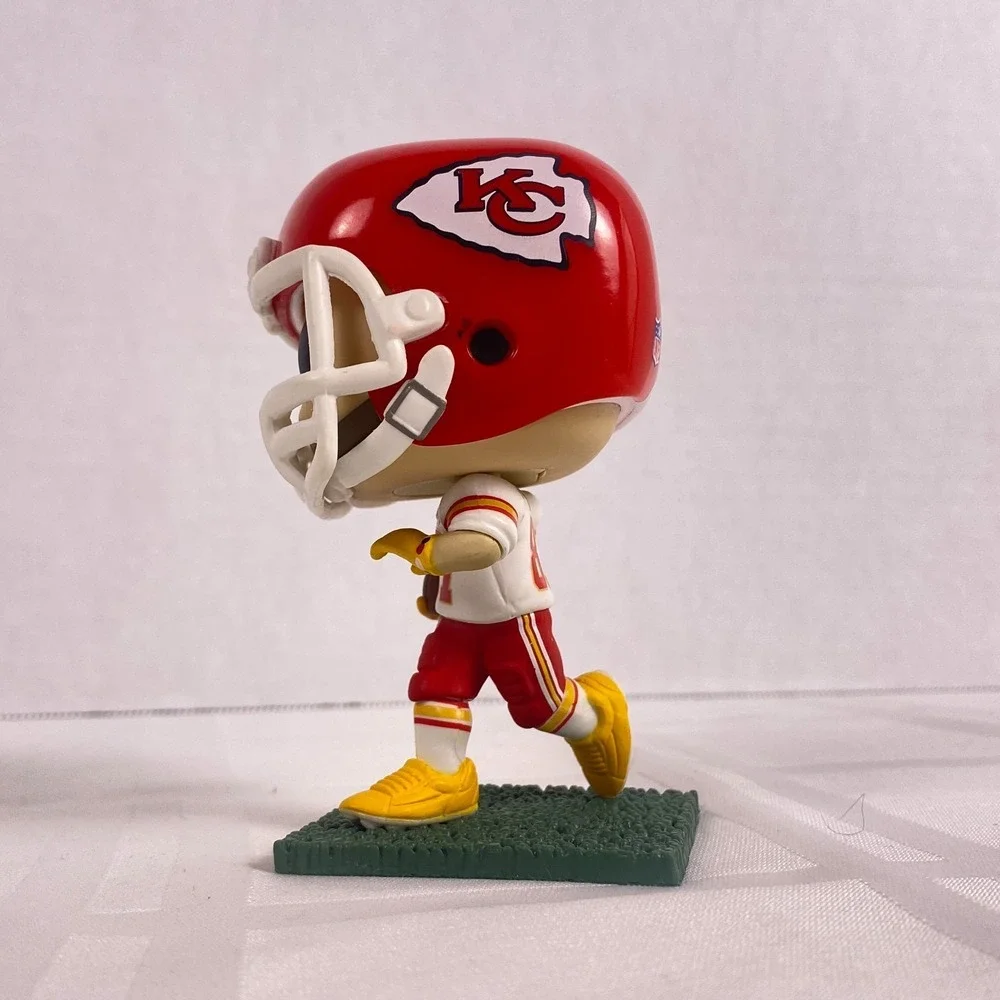 Funko Pop! NFL Travis Kelce w/ Swiftie Friendship Bracelet #257